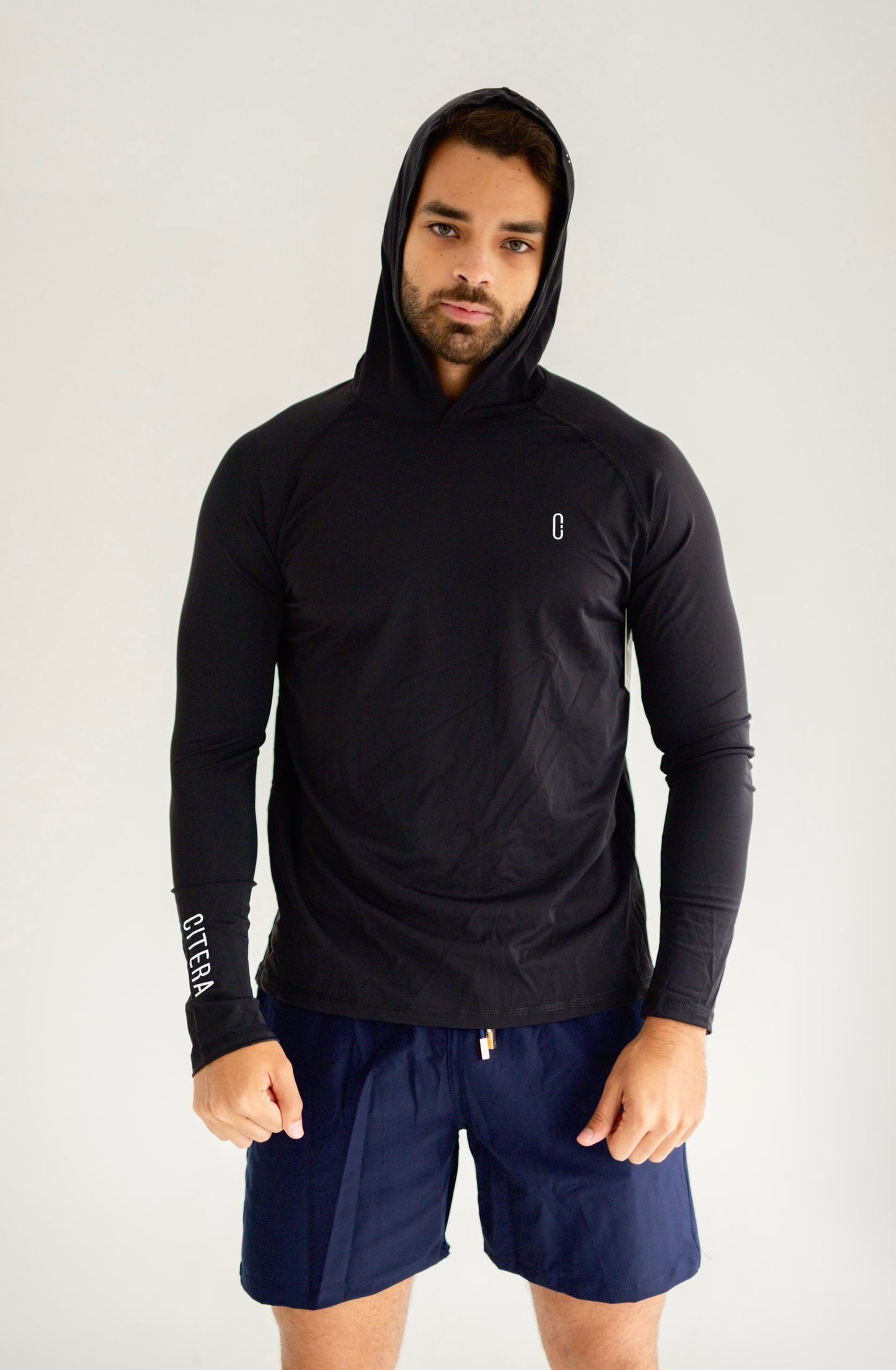Franela UV Con Capucha Negro