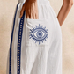 Pantalon Blanco Ojo Azul